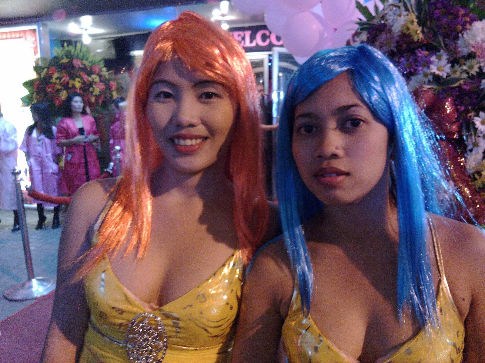 Staff outside the Dollhouse bar on Walking Street, Angeles City