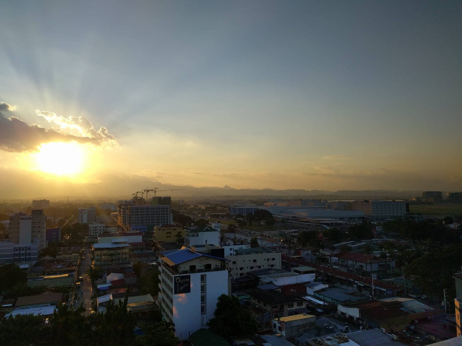Sunset over Angeles City with the Clark Freeport Zone and the Zambales mountains on the horizon